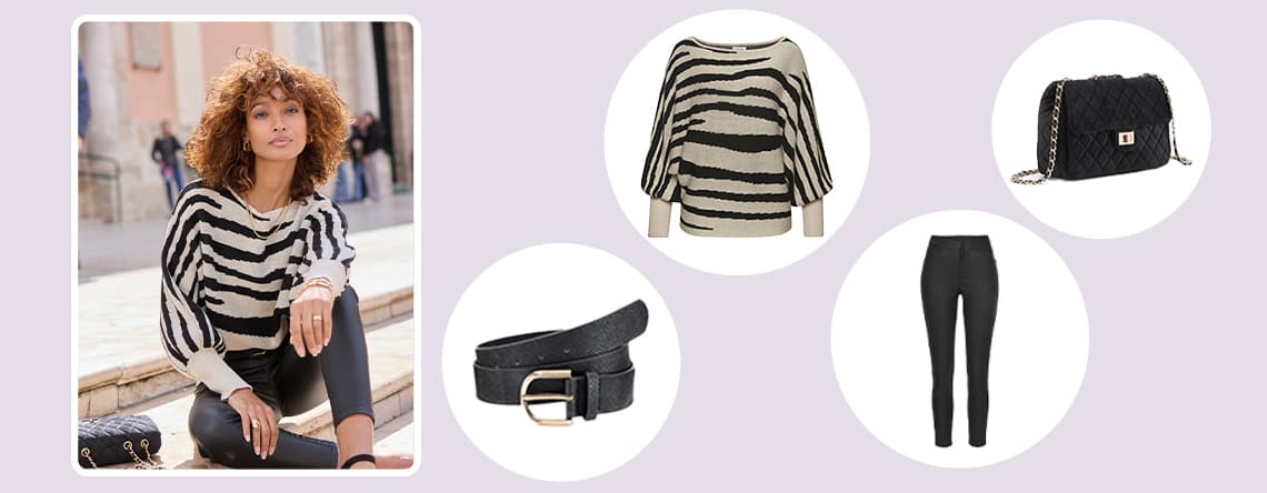 Frau sitzt draußen und trägt gestreiften Pullover, schwarze Hose, Gürtel und schwarze gesteppte Tasche